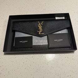 Black designer envelope clutch w/ gold logo (new)