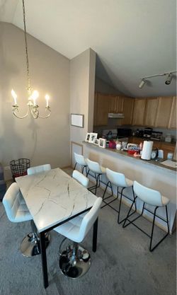 Dining table and chairs set
