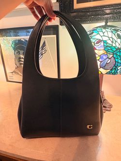 Brand New black Coach Lana Shoulder Bag crafted from polished pebble leather