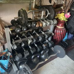 Rack & dumbbells Weight 5.10 .15.20.25.30 35 Only 1 ,50 Pounds &1. 45 Pons 8 Pons & 