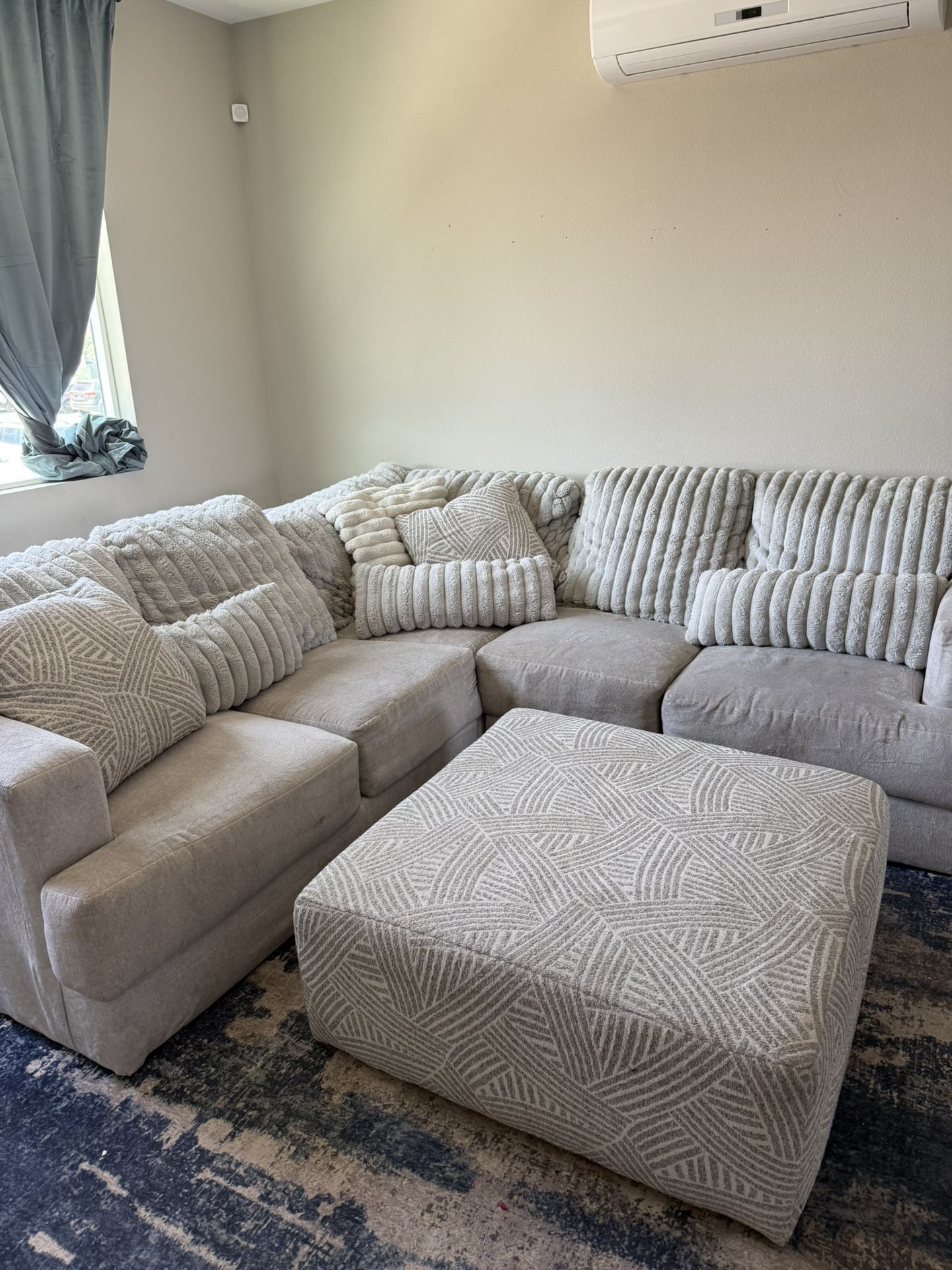 Sectional Couch, Rug and Pillows