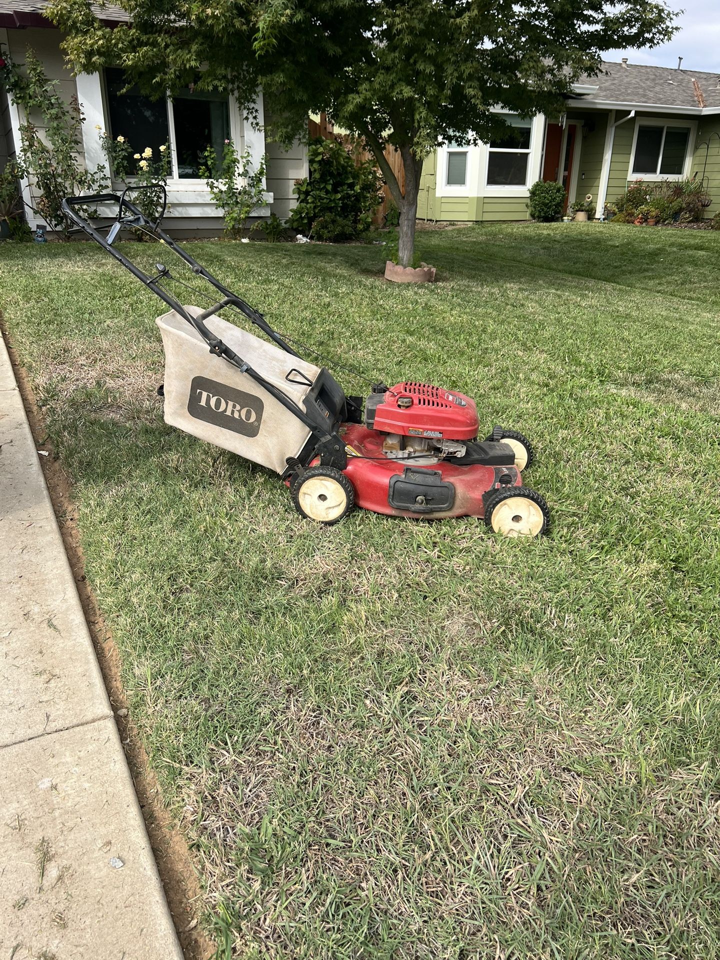 Gas Powered Toro lawn Mower. Works GREAT!