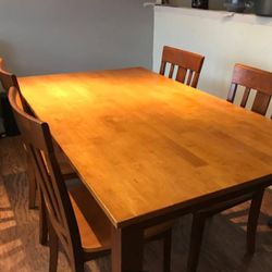 Wooden Dining table w. 4 chairs