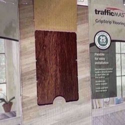 *Sale* TrafficMaster - Cherry 4 MIL x 6 in. W × 36 in. L Grip Strip Water Resistant Luxury Vinyl Plank Flooring (24 sq.ft./case) 