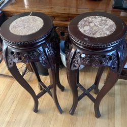 A pair of flower pot stands