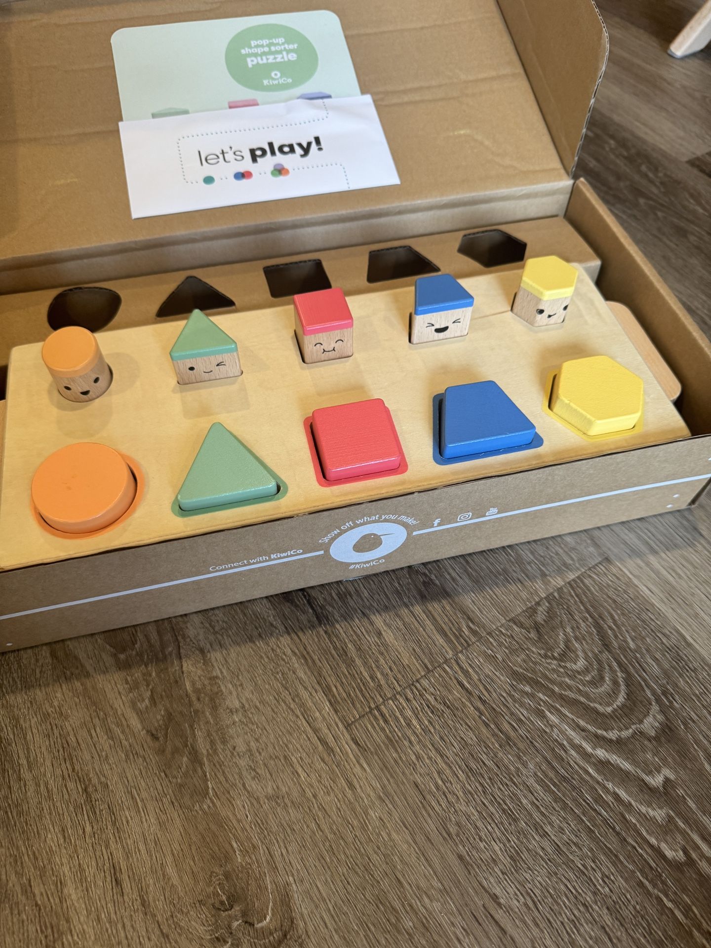 KiwiCo pop-up shape sorter puzzle