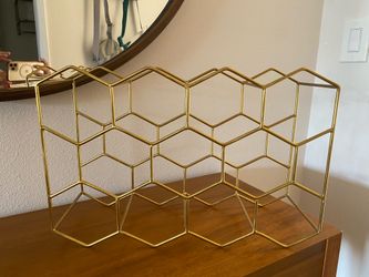 Crate and Barrel Gold Honeycomb Wine Rack - $35