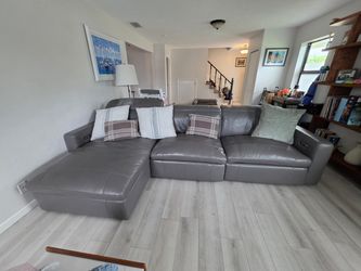 Rooms to go leather grey recliner