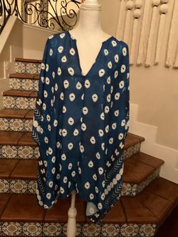 Blue & white polyester tunic with white circular and arrow motifs. Swimwear cover up,size one size