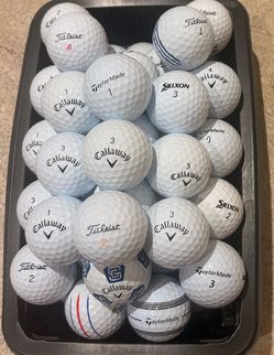 50 Golf Balls As Pictured- Callaway, TaylorMade, Titleist….