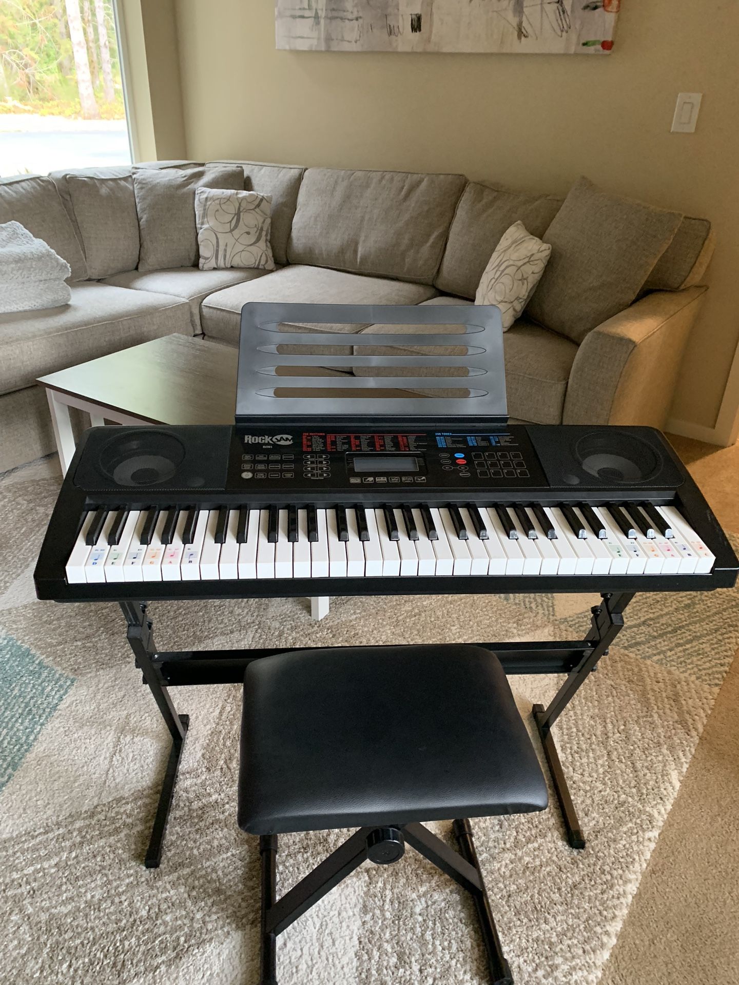 The RockJam 761 keyboard piano super kit includes a digital keyboard with 61 full-size