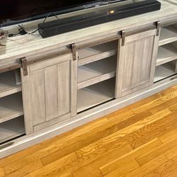 Carynhurst 70’’ TV Stand- Ashley Furniture 