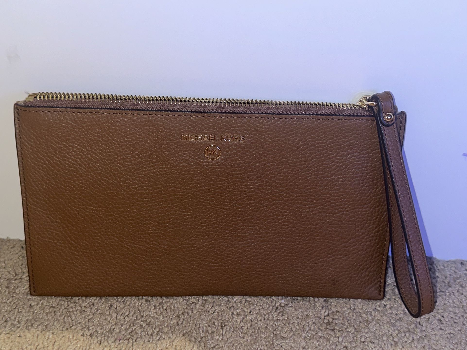 Michael Kors tan pebbled leather wristlet Large