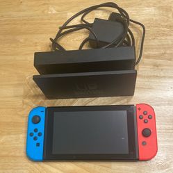 Nintendo Switch w/ Games (pictured) Included
