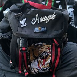 gucci patched embellished canvas backpack