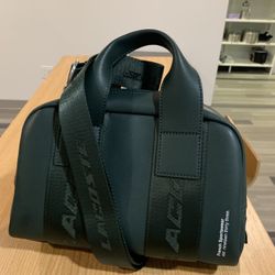 Lacoste leather mini bowling/travel bag 