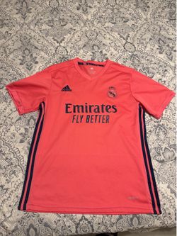 Real madrid pink jersey.