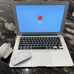 Mac Book air With Charger And Apple Mouse 