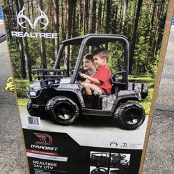 Realtree 24 volt utv ride on by dynacraft with custom realtree graphics and working hot sale headlights