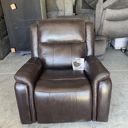 LEATHER POWER ROCKER RECLINER WITH POWER ADJUSTABLE HEADREST 