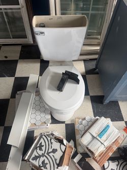 White Two-Piece Toilet with Chrome Flush Handle
