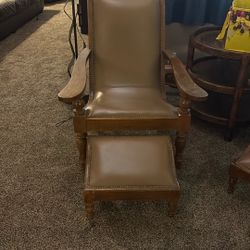 2 Leather Chairs with Ottomans