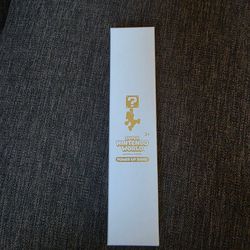 UNIVERSAL STUDIOS SUPER NINTENDO WORLD GOLD MARIO POWER UP BAND ANNIVERSARY