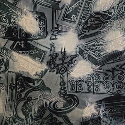 burnt velvet (devoré) scarf with a Gothic-inspired design featuring candles, books, and ornate scrollwork. 