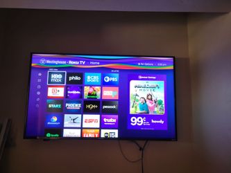 50" Westinghouse Roku Smart TV with wall bracket.
