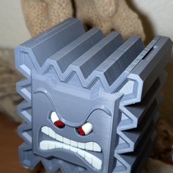 Thwomp Your Way to Organized Gaming: Store your Switch games in style with this Mario Bros villain.