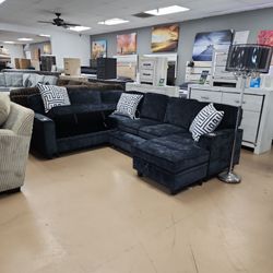 Charcoal Gray Sectional With Pop-up Sleeper Hidden Storage And USB Charging Ports With Cup Holders
