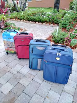 21 inch Carry on suitcase. $19 each