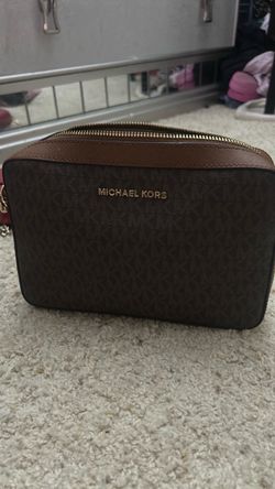 Brown Michel Kors with strap