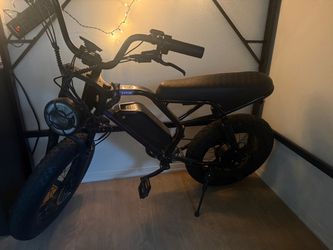 E-bike with charger 28 mph.