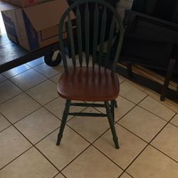 One Green And Wooden Chair