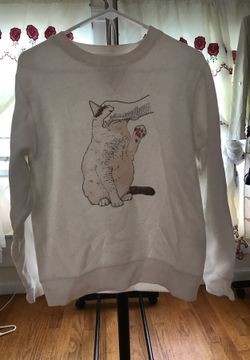 White cat sweater