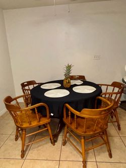 Round dining table-antique wooden table, chairs.