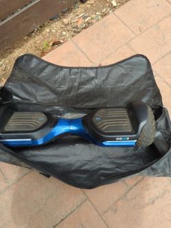 gyroor hoverboard with a carry case.