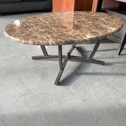 Faux marble oval coffee table (in store)