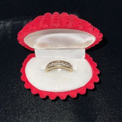 10k band with 9 stones(price available upon request)