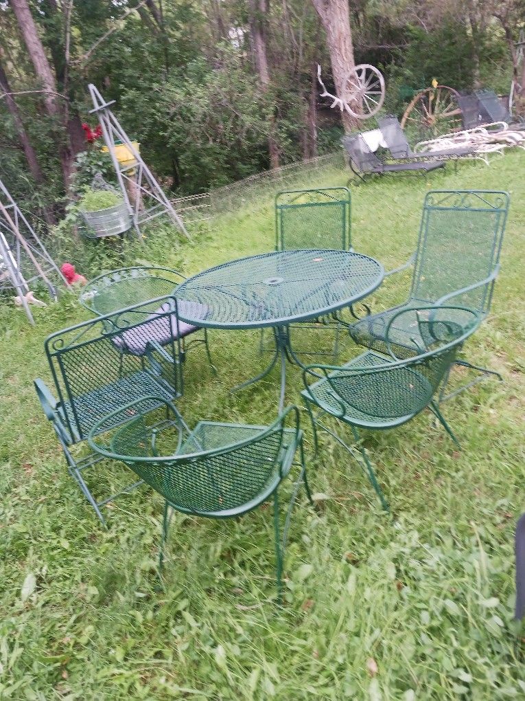 Wrought Iron Table With Six Wrought Iron Chairs