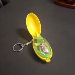 Takara Pocket Critters Puppy Pals Collectible Keychain, Press A Button & Shell Opens Showing 2 Puppies Playing