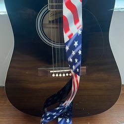 Black Acoustic Gutair