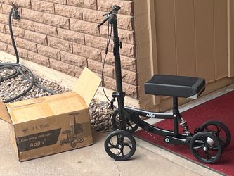 Knee Scooter, New, just missing frt bag. Cheap !