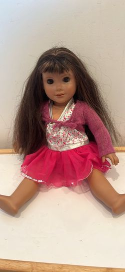 This doll is the American Girl Truly Me, clean / soft hair / very nice