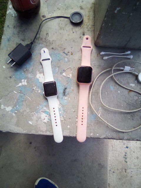 A Pink And White Apple Watch  Good Condition 