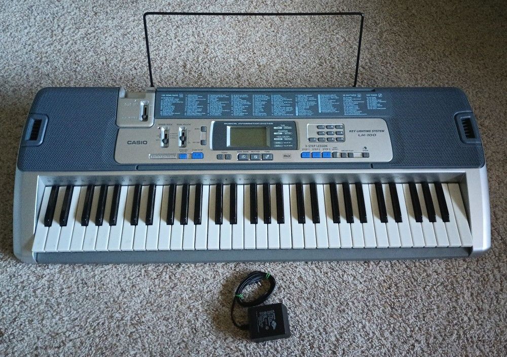 Casio LK-100 Lighting Music Keyboard with LCD Display