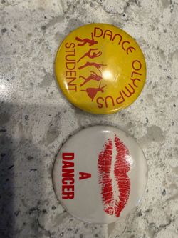 (2) Vintage Button “Kiss A Dancer” And “Dance Olympus Student”. Both Are 2.25”