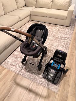 Evenflo Shyft DualRide with Carryall Storage Infant Car Seat and Stroller Combo (Boone Gray)