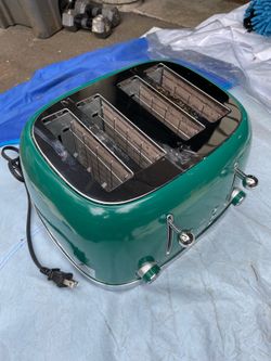 4 slice toaster. Slightly used.